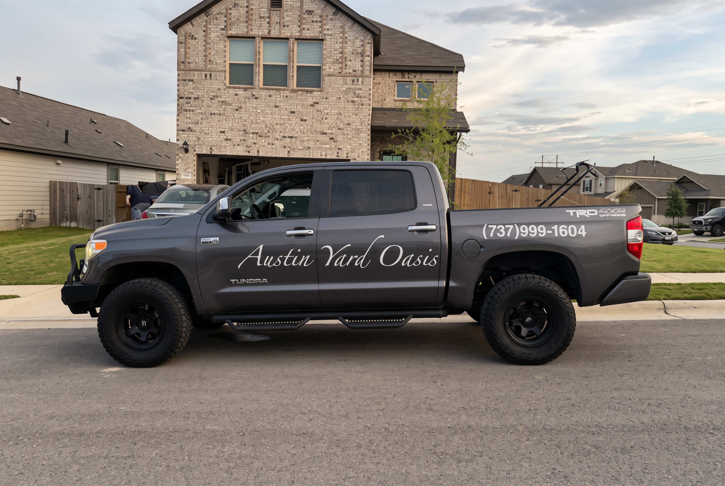 Austin Yard Oasis service truck parked at a residential landscaping job in Austin, TX