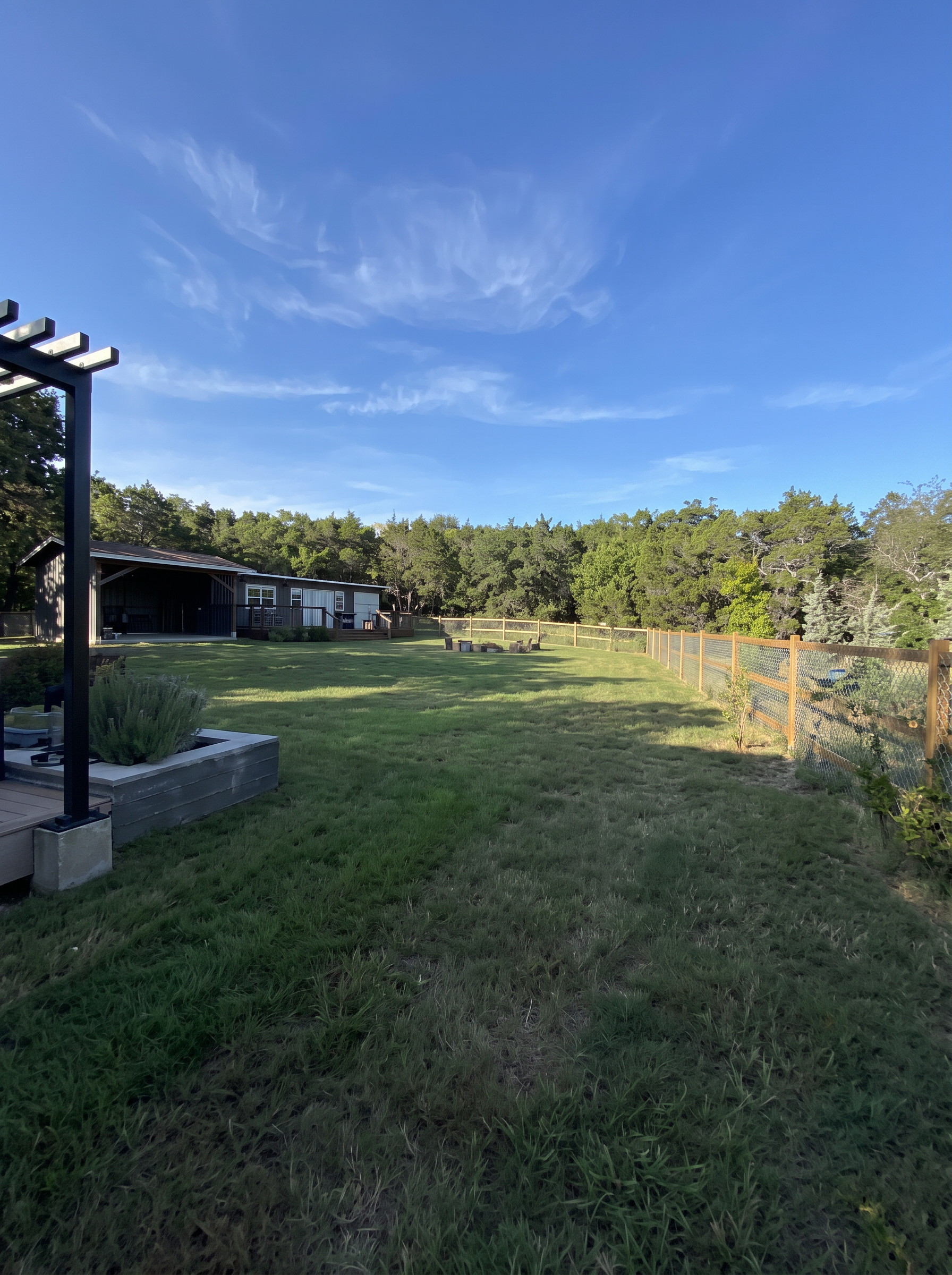 Open backyard lawn care project completed by Austin Yard Oasis in Austin, TX