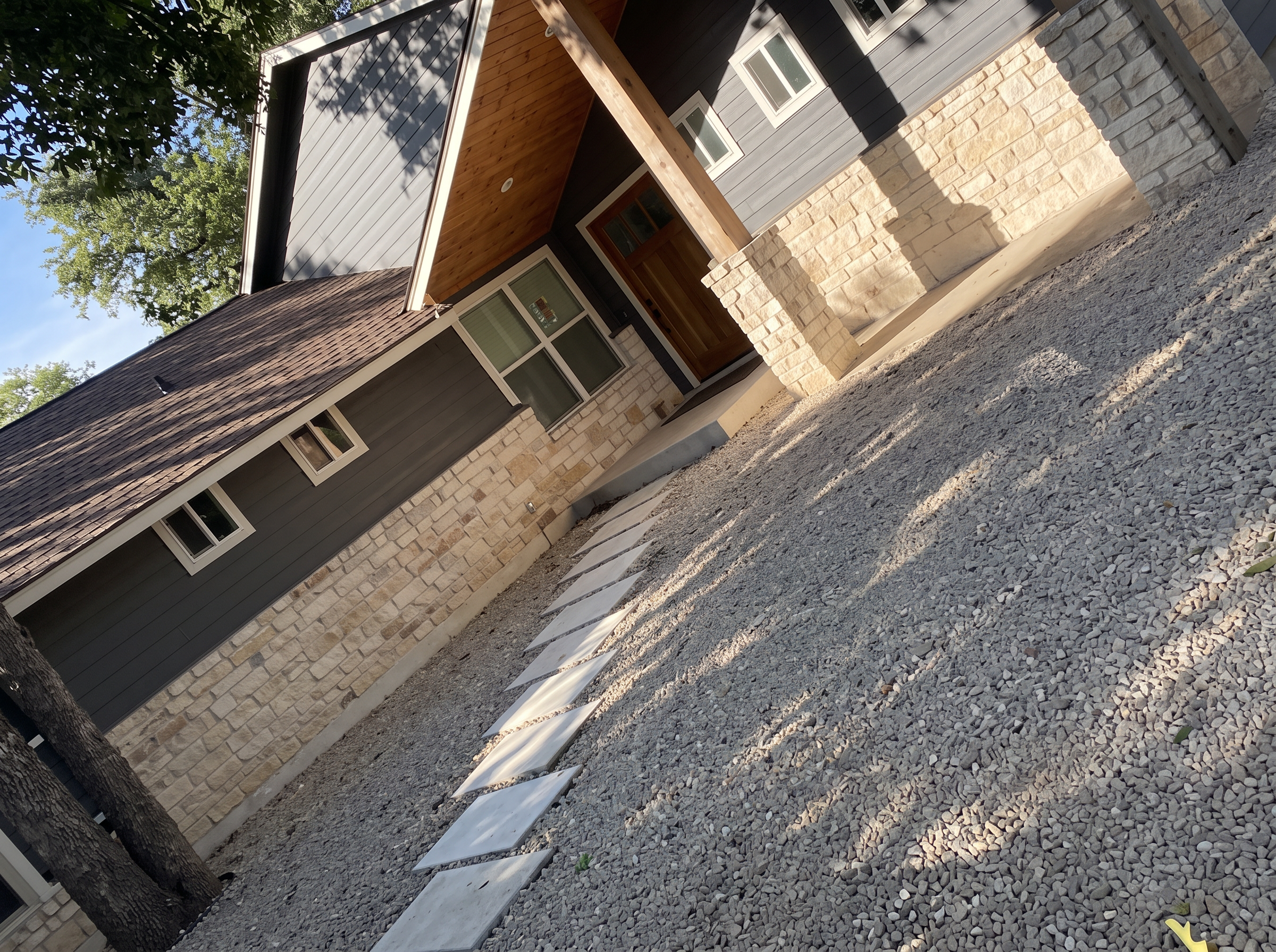 Modern home gravel driveway project completed by Austin Yard Oasis in Austin, TX