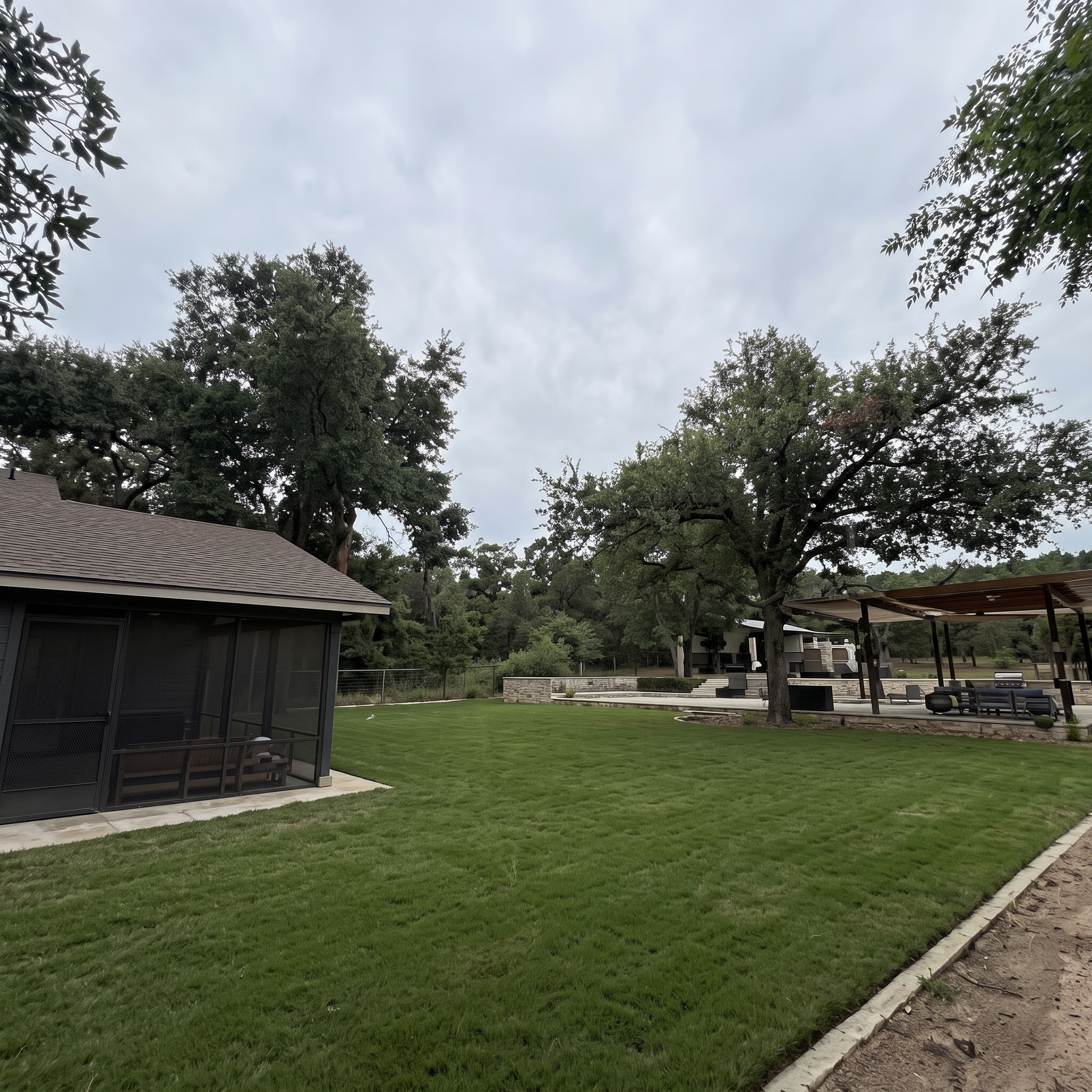 Backyard patio lawn care project completed by Austin Yard Oasis in Austin, TX