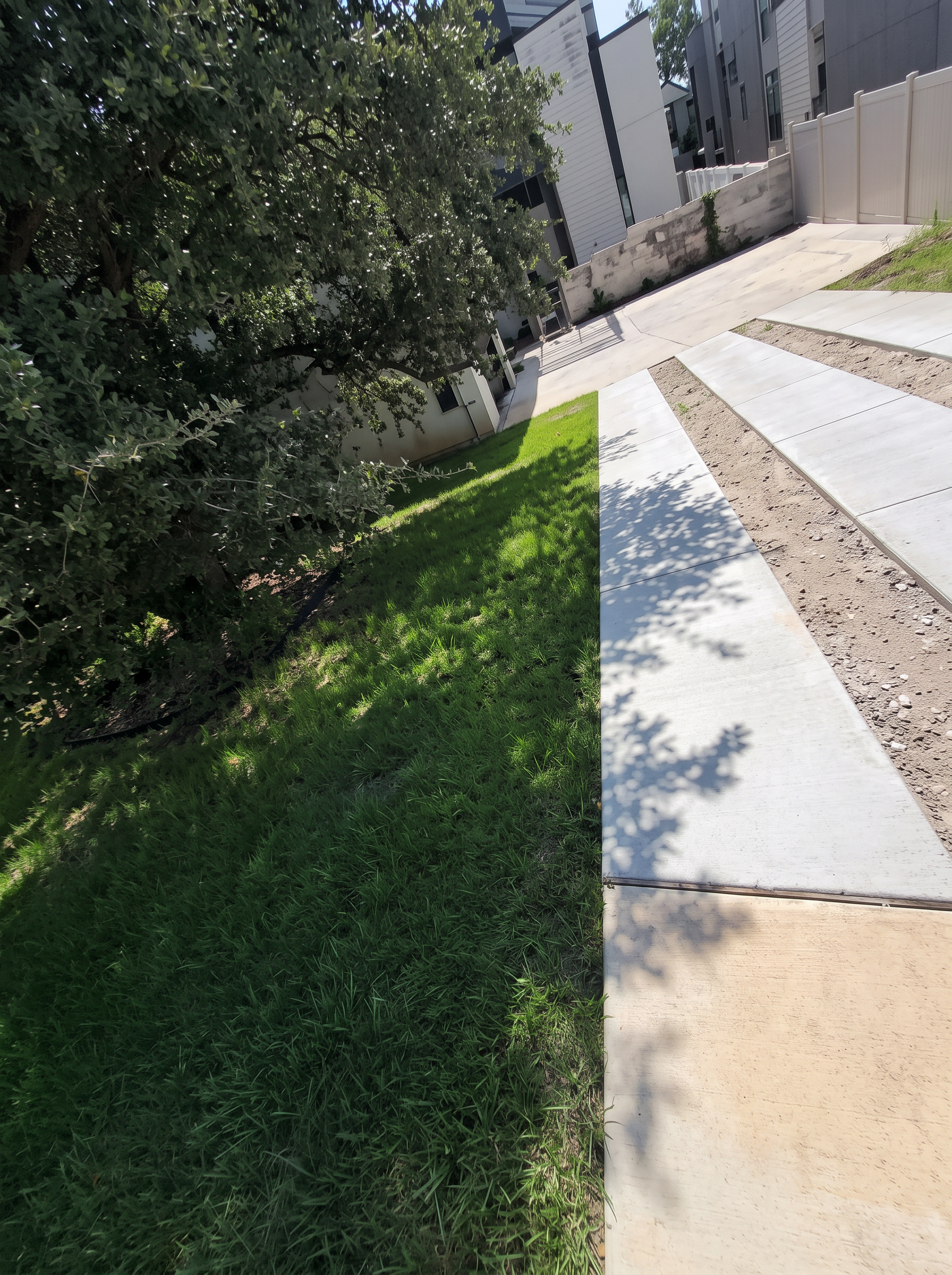 Sidewalk lawn edging project completed by Austin Yard Oasis in Austin, TX