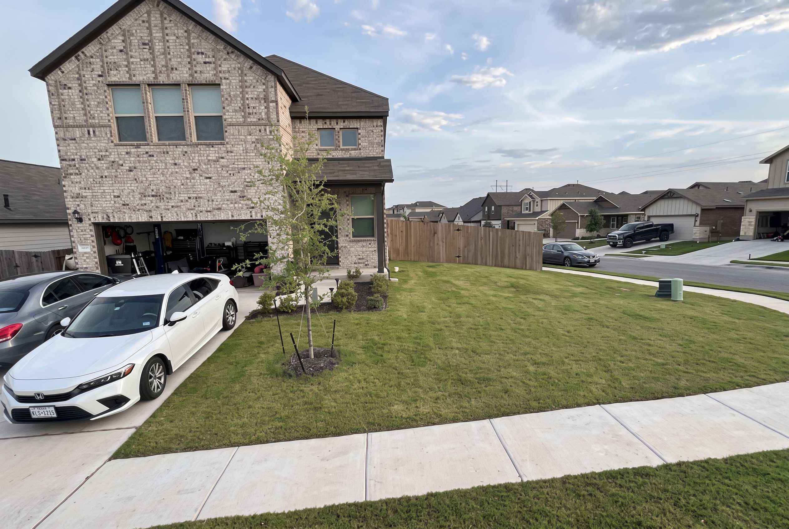 Front yard lawn mowing project completed by Austin Yard Oasis in Austin, TX