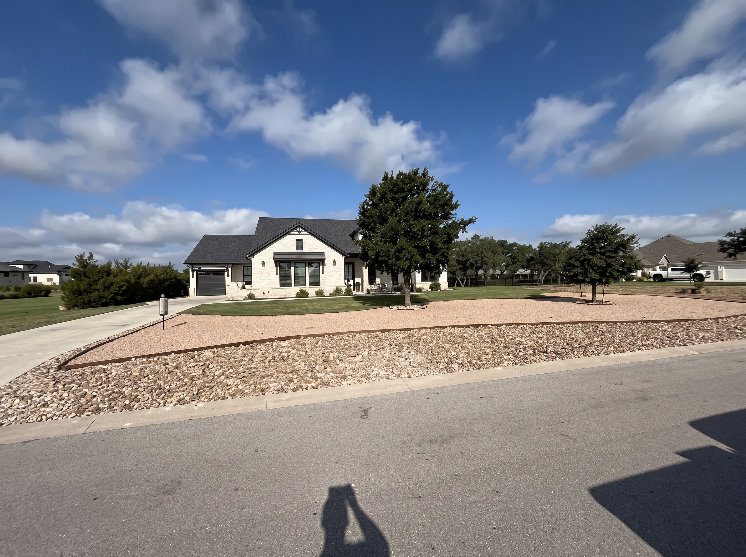 Circle driveway landscaping project completed by Austin Yard Oasis in Austin, TX